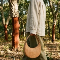 Crescent Shoulder Bag in use, under cork oaks